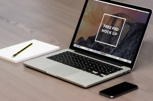 Macbook Pro On Desk Mockup PSD