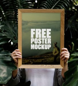 Woman Holding Poster In Forest PSD Mockup