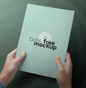 A4 Paper In Hands PSD Mockup