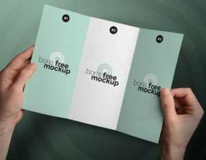 Holding Tri-fold Brochure PSD Mockup